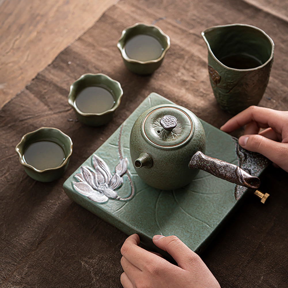 Close-up of the lotus leaf pattern on the Kyusu teapot, showcasing intricate hand-carved textures