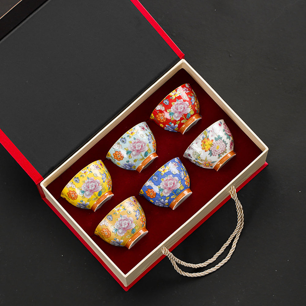 Elegant six-color enamel Kung Fu tea set on display with peony design.