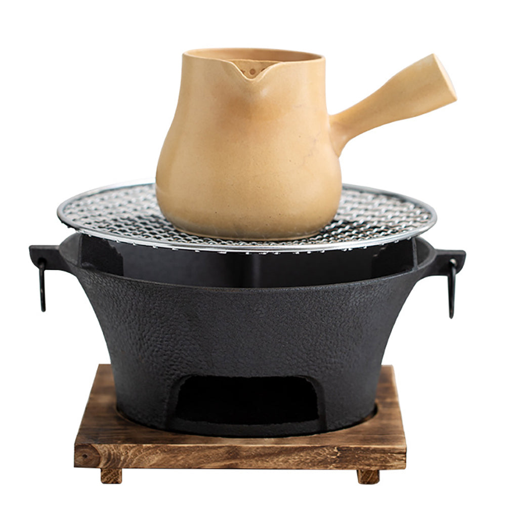 Versatile cast iron tea stove set with grill, ideal for outdoor gatherings.