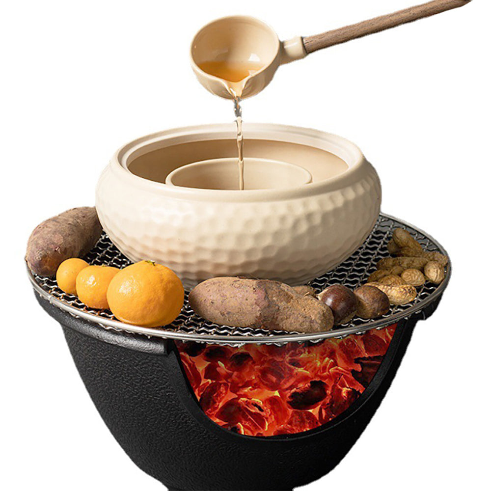 Cast iron tea cooker set displayed with a teapot and tea spoon, highlighting its durable features.