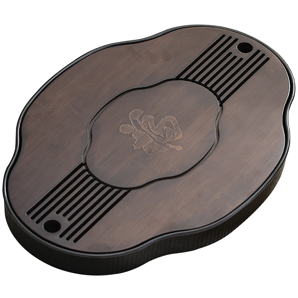 Close-up of bamboo tea tray with hollow striped design for Gong Fu tea