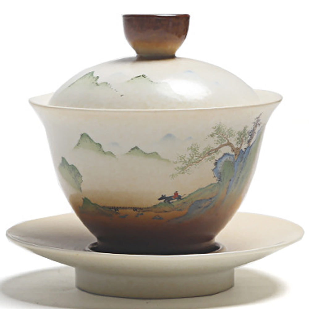 Close-up of the artisan Chinese Gaiwan with vintage landscape painting, highlighting its detailed design.