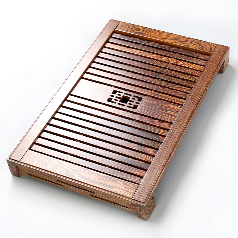 Elegant bamboo tea tray with water reservoir, displaying its intricate stripe design.