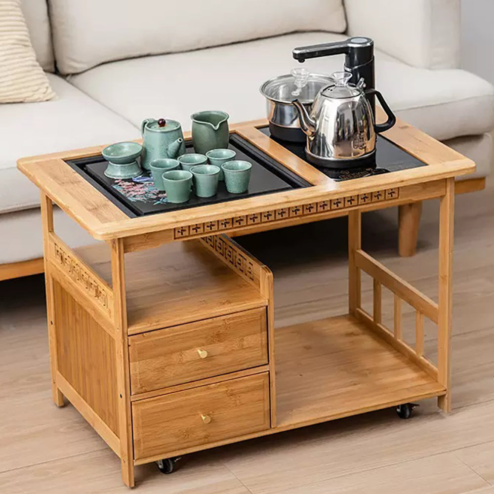 Versatile bamboo tea cart with heating function in a cozy tea setup.
