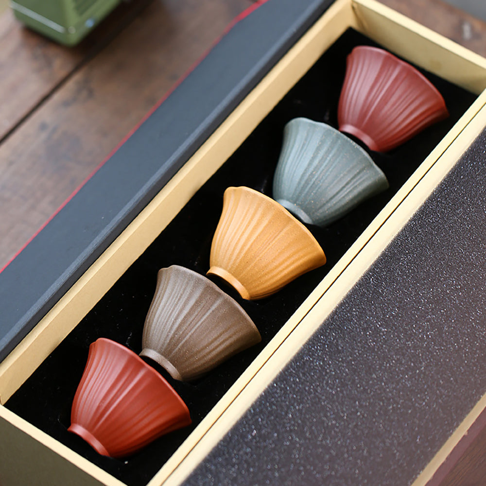 Colorful Cowherd Flower Purple Clay Tea Cup Set in a gift box, ideal for tea lovers.