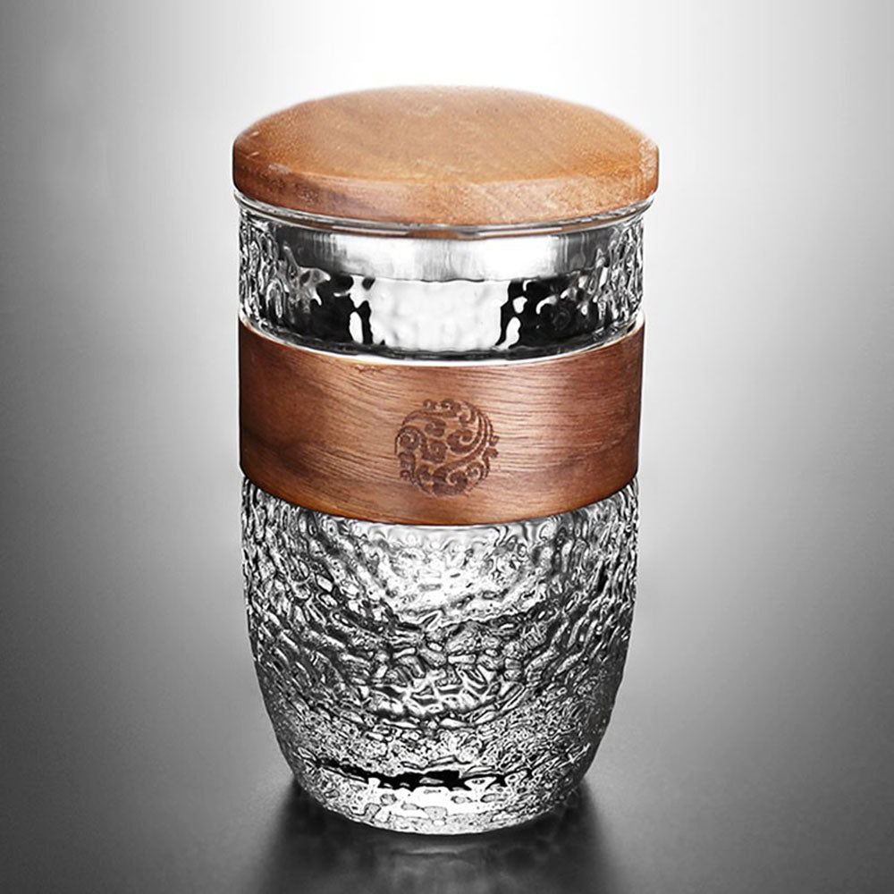 Artisan Japanese glass tea cup with wooden lid, displaying the elegant design and glass texture.