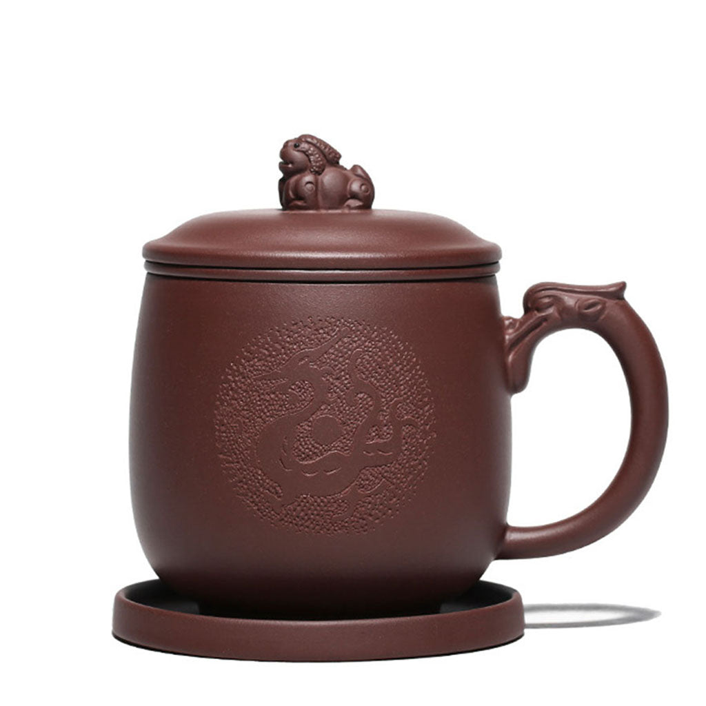 Close-up of purple clay dragon tea cup with infuser, showing detailed dragon handle and lid