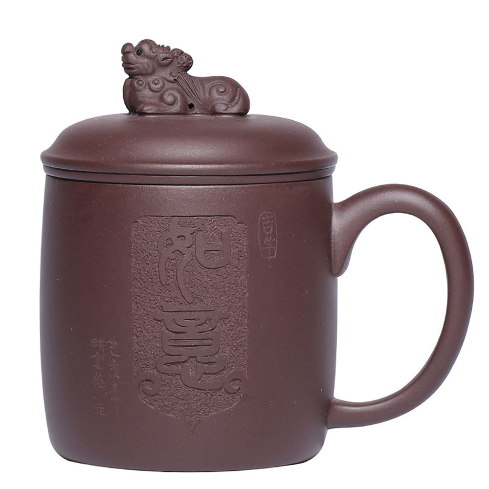 Close-up of the purple clay lion tea cup with infuser, highlighting the lion lid and craftsmanship