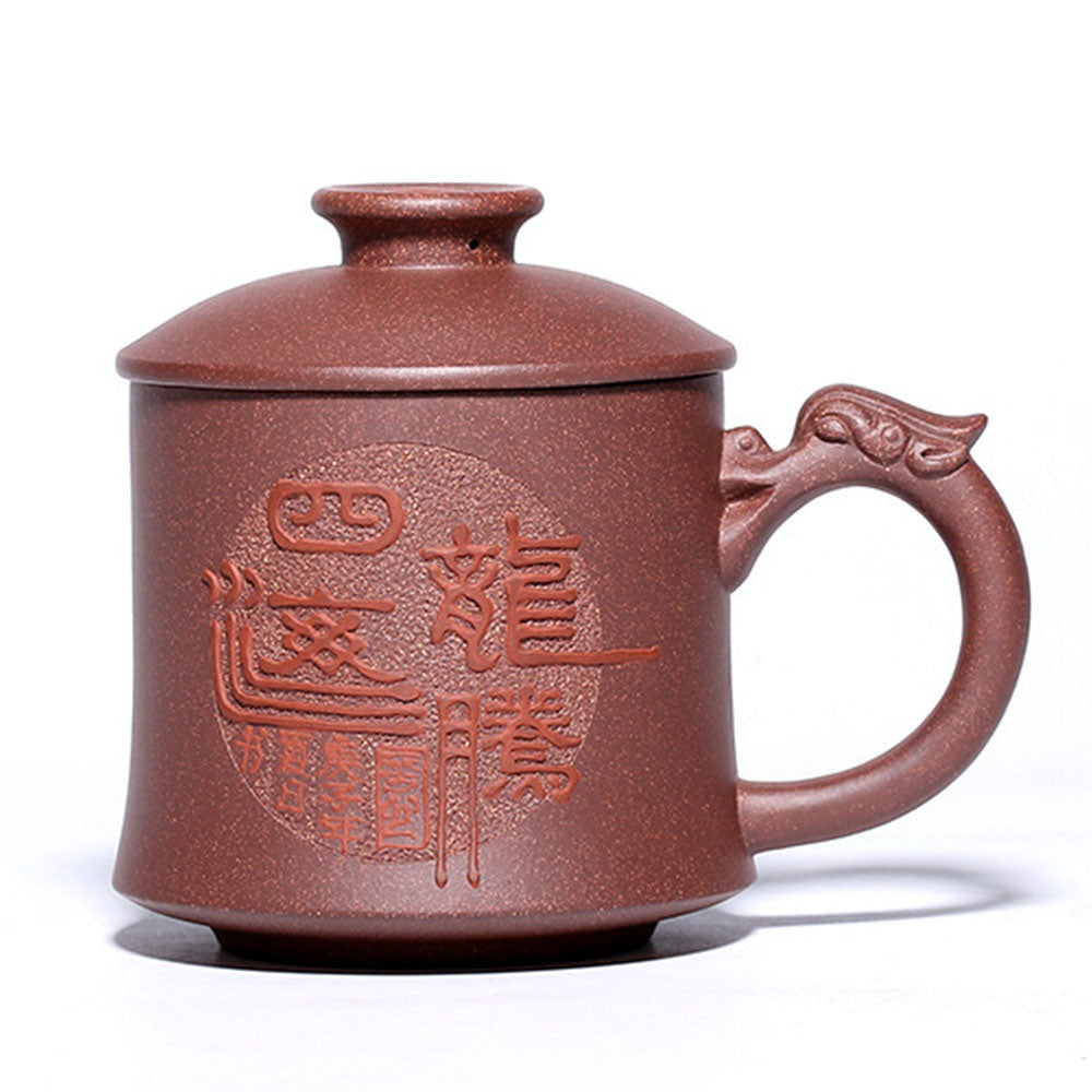 Close-up of dragon handle teacup made from Yixing purple clay, highlighting detailed craftsmanship