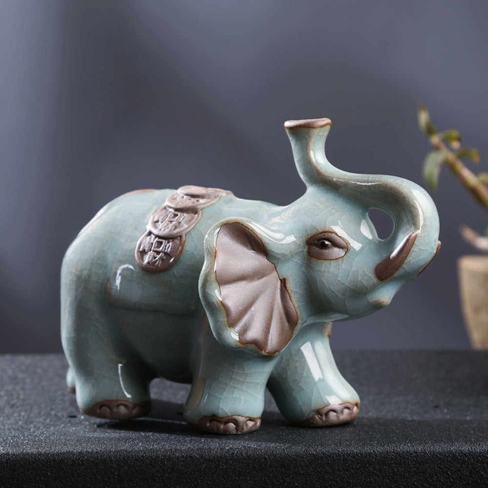 Elegant Ru Yao Elephant Tea Pet on a tea tray, showcasing traditional Chinese craftsmanship