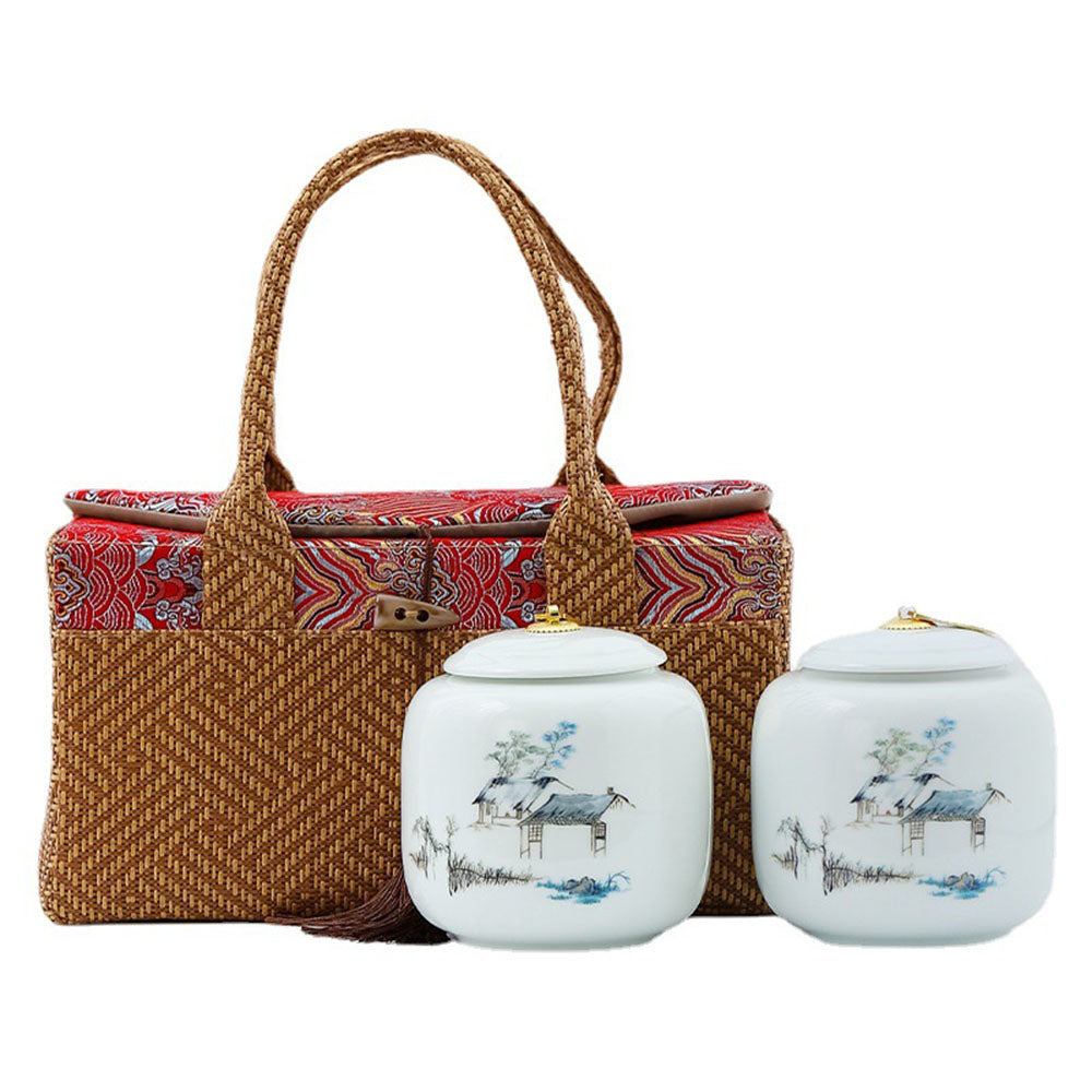 Elegant porcelain tea caddy set with gift bag, showcasing its sleek design and functionality.