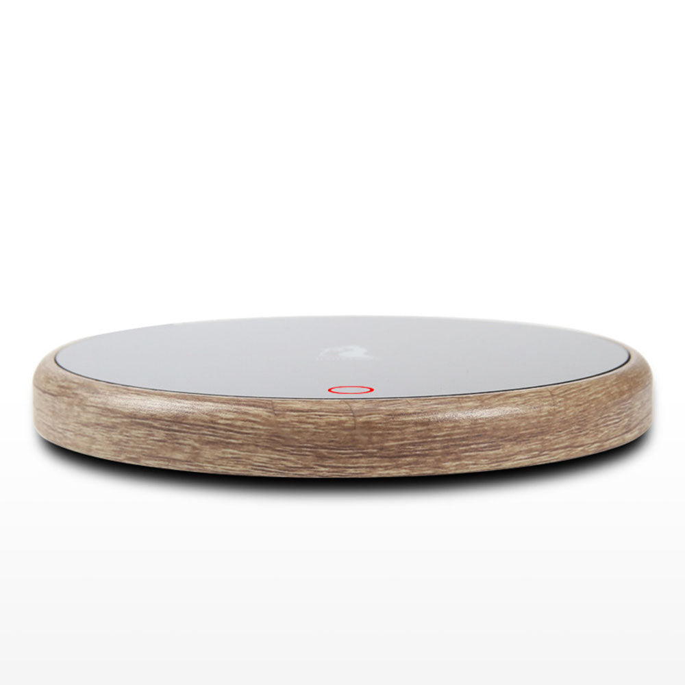 Elegant electric tea warmer showcasing its sleek design and black sandalwood finish, perfect for tea lovers.