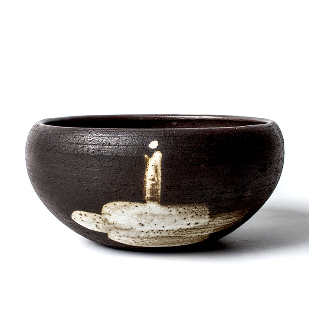 Zen Monk Ceramic Tea Washer showcasing its elegant design and functionality.