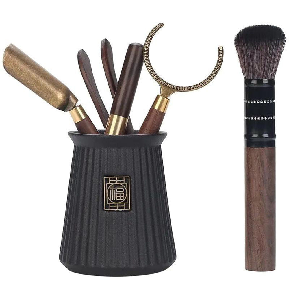 Overhead view of ebony tea utensils inside ceramic holder—perfect as a premium tea utensils set for gift