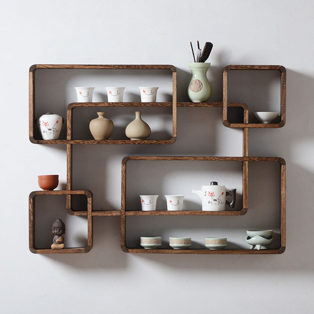 Side view of the handmade wooden display cabinet showcasing its layered compartments
