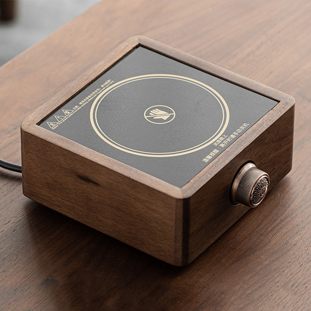 Walnut wood electric tea stove with adjustable temperature control on countertop