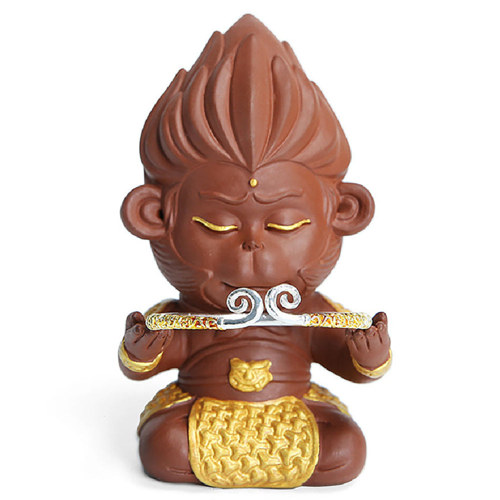 Close-up of Sun WuKong Yixing clay tea pet with detailed carvings