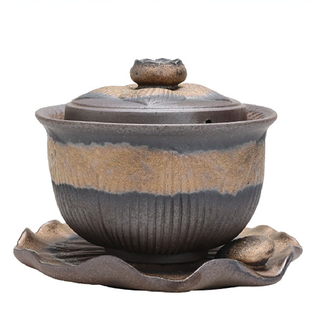 Top view of the handmade Chinese gaiwan teapot showing lotus lid and rustic glaze