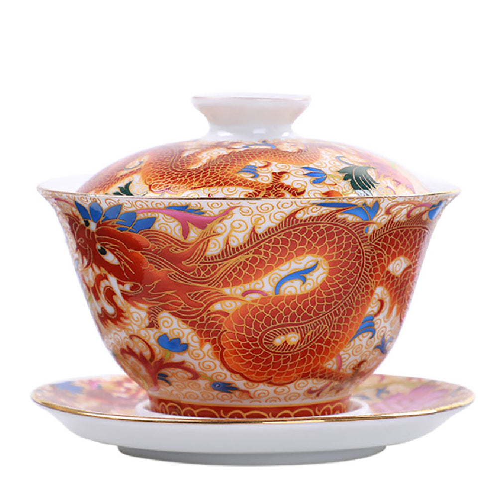 Elegant enamel porcelain gaiwan showcasing intricate dragon phoenix design from the side.