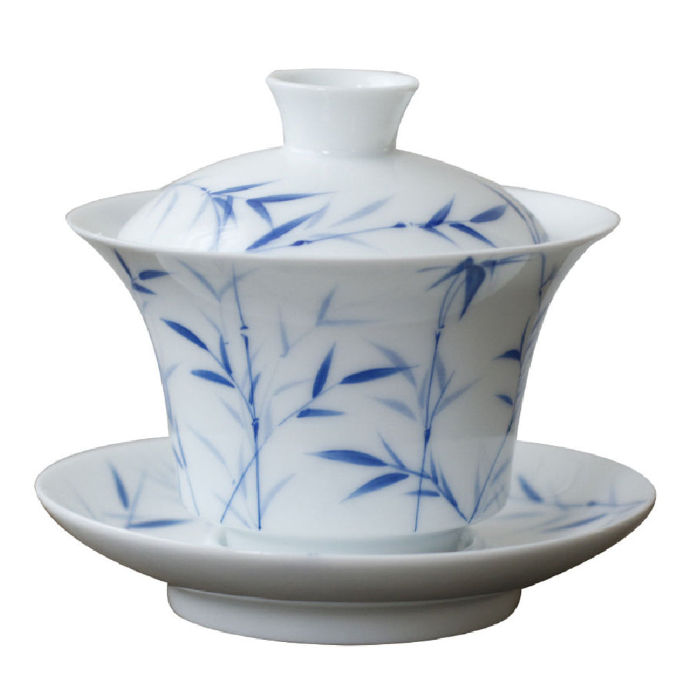 Close-up of hand-painted bamboo motif on porcelain gaiwan