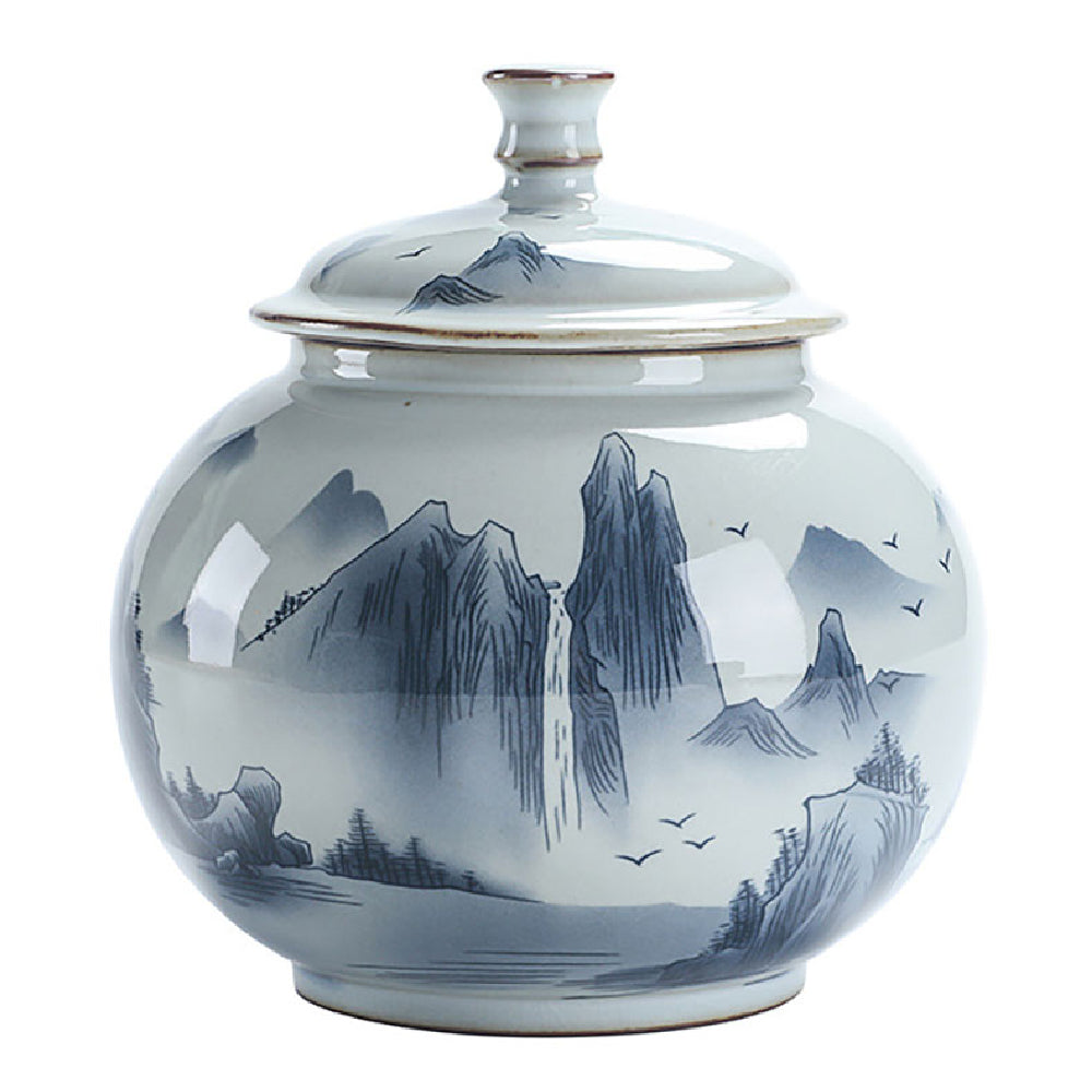 Elegant hand-painted landscape tea caddy showcasing its intricate design and airtight lid.