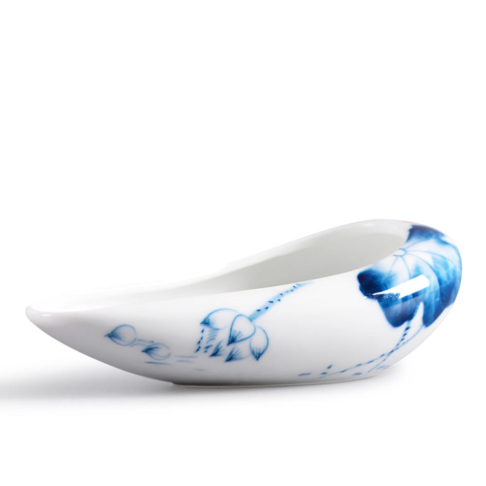 Close-up of hand-painted lotus porcelain cha he showcasing intricate details