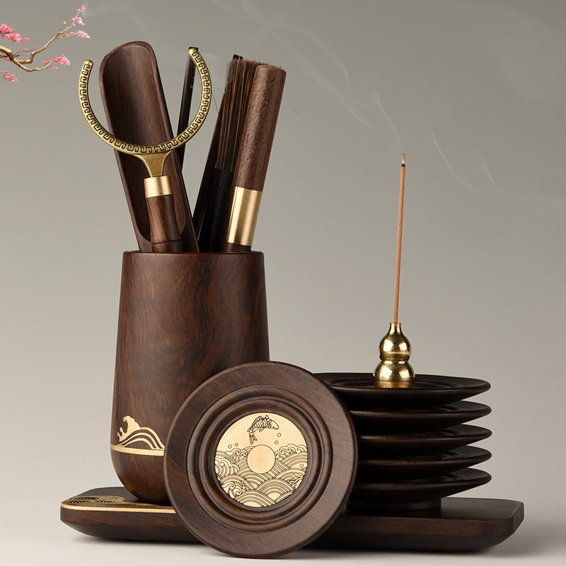 Gong Fu tea set with incense holder displayed elegantly on a wooden surface.