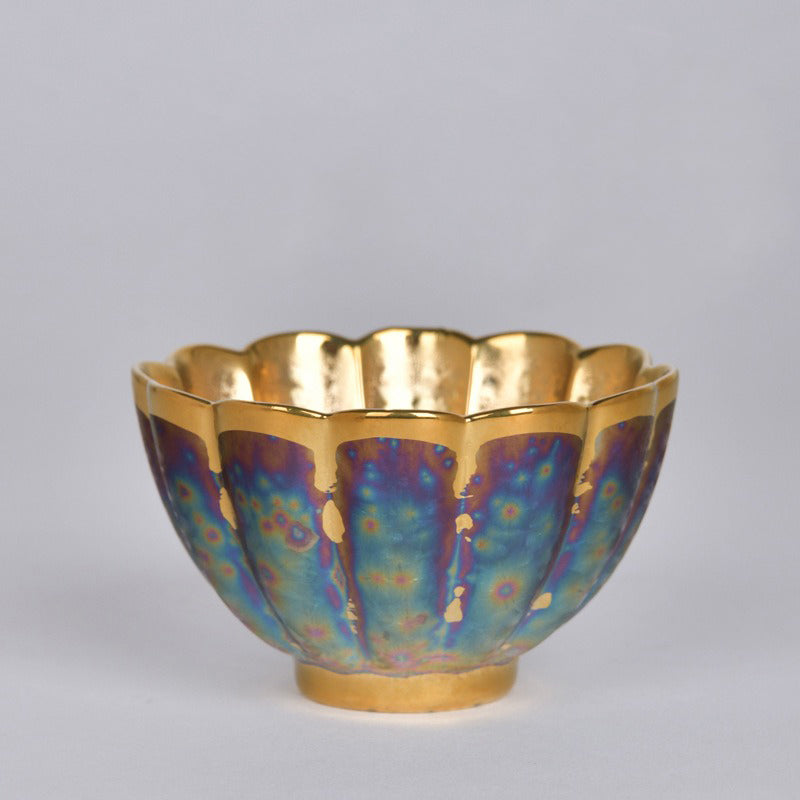 Close-up of the Elegant Gold Jian Zhan Tian Mu Gongfu Tea Cup, showcasing its intricate design and sterling silver lining.