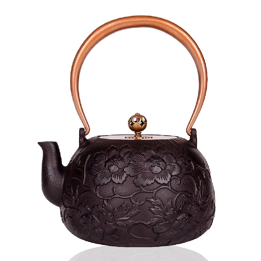 Angle view of the elegant peony cast iron teapot with rose gold handle, showcasing its intricate design.