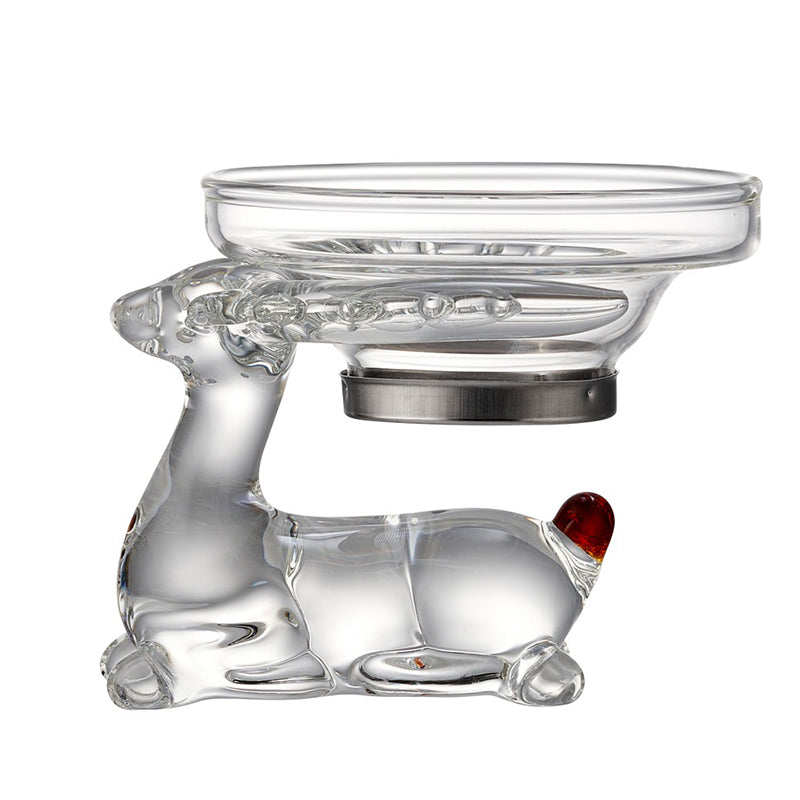 Side view of elegant glass tea strainer with deer holder, showcasing its charming design.