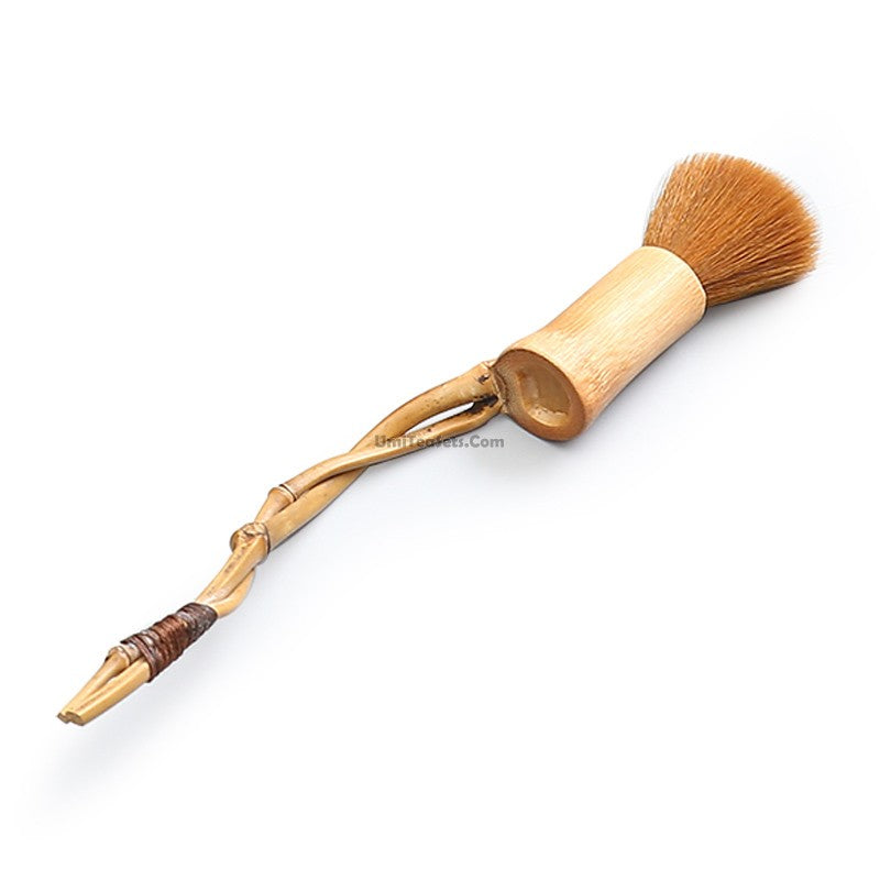 Close-up of the premium bamboo teapot cleaning brush showcasing its bristles and handle.