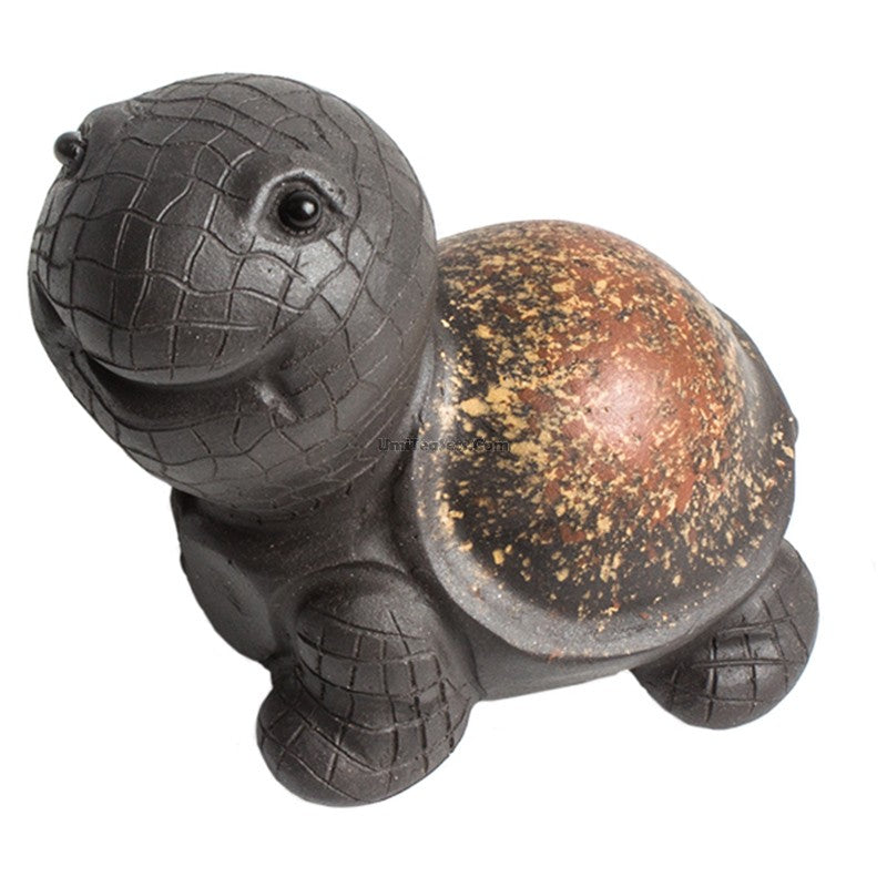 Close-up of the handmade Yixing Clay Tortoise Tea Pet showcasing its intricate details and craftsmanship.