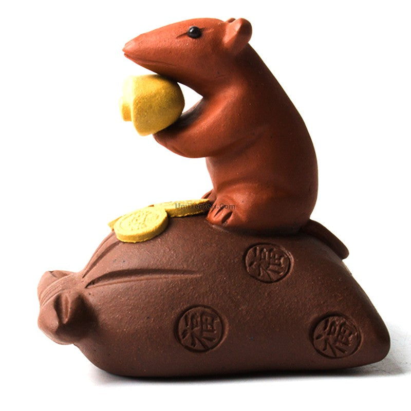 Purple clay tea pet with mouse and treasure design, side view, ideal for tea enthusiasts