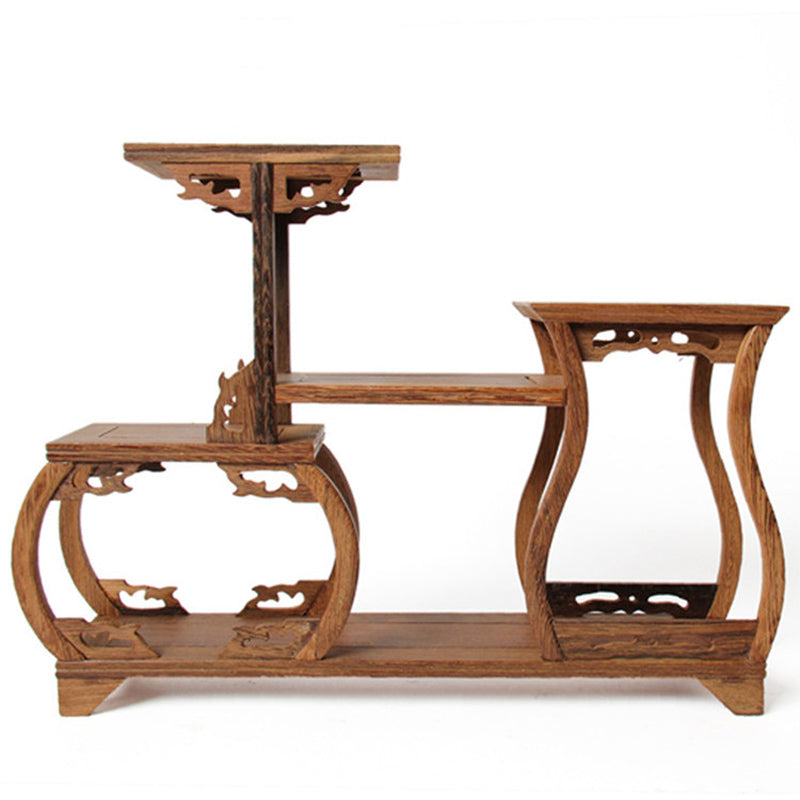 Close-up of helicopter style tea set stand showcasing the wooden craftsmanship
