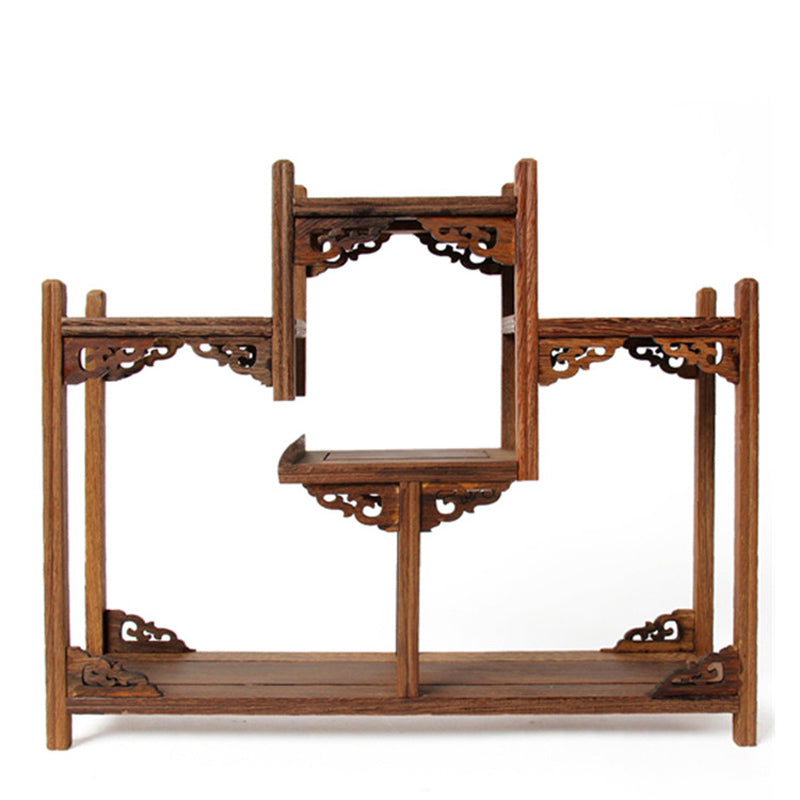Close-up of handcrafted solid wood tea shelf with teaware organized
