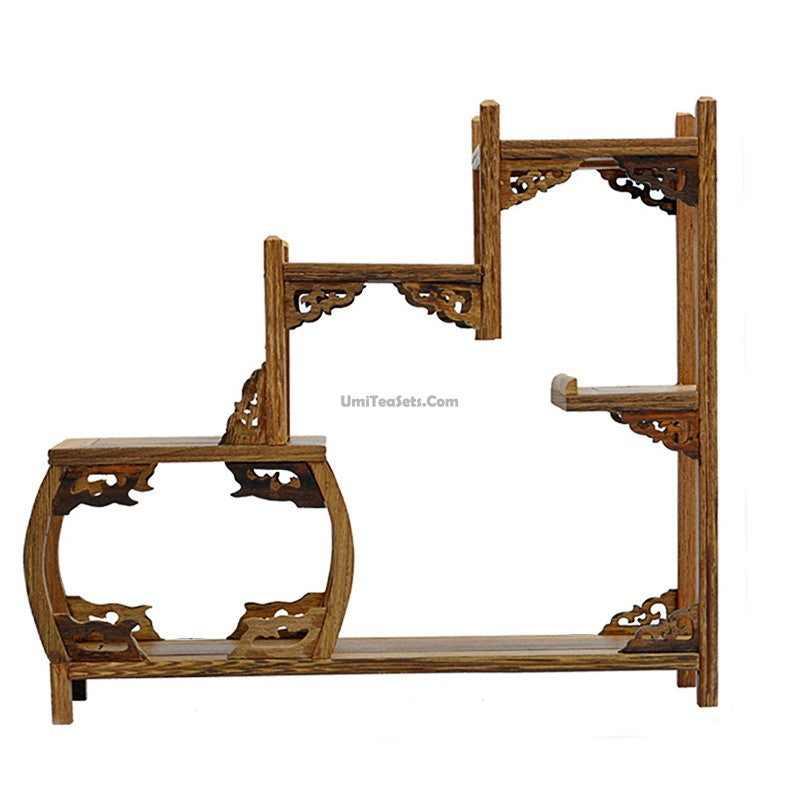 Elegant Rosewood Tea Set Holder showcasing tea sets elegantly displayed.