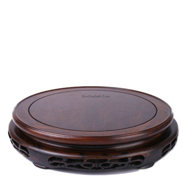 Close-up of the textured surface of the Catalpas wood teapot stand showcasing natural grain