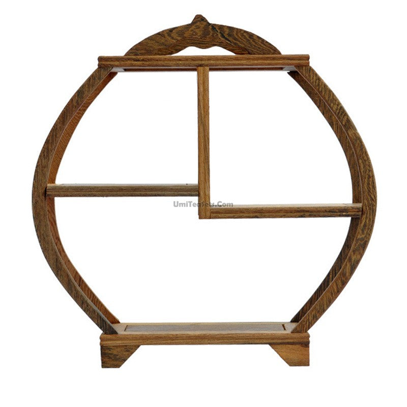 Close-up of the textured wenge wood round tea stand showcasing its unique grain pattern