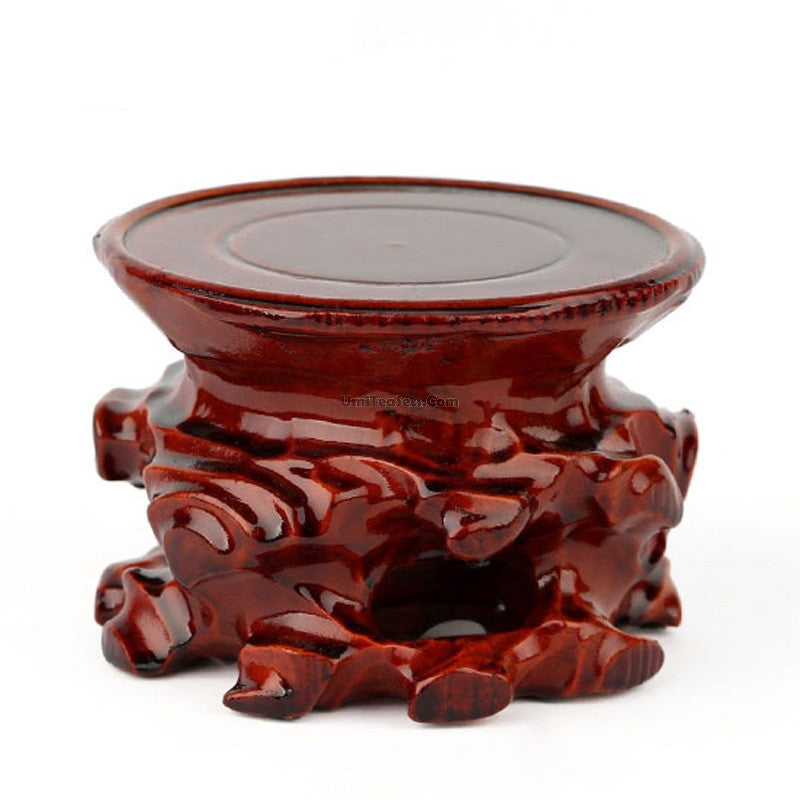 Artisan Rosewood Tea Cup Stand from the side, highlighting its unique texture and craftsmanship.