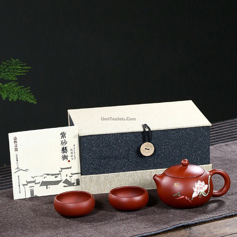Close-up of the purple clay teapot showcasing the intricate lotus design and fine mesh filter.