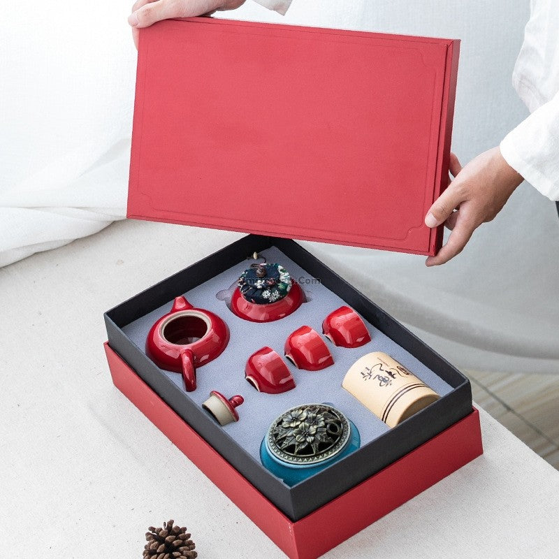 Elegant Chinese Red Tea Set displayed with gift box, showcasing craftsmanship.