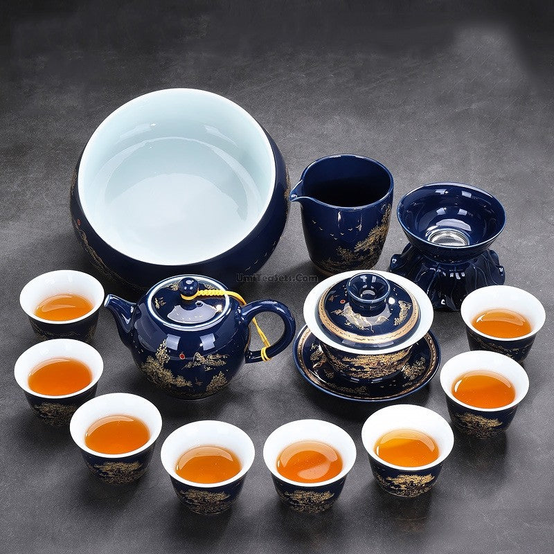 Elegant blue and white porcelain tea set with intricate relief carvings, perfect for traditional Chinese tea brewing