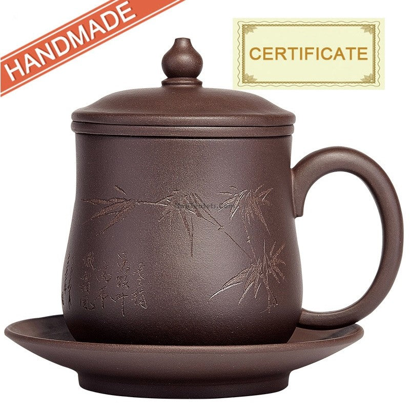 Side angle of the Premium Yixing Handmade Tea Cup with infuser, highlighting its unique bamboo design.