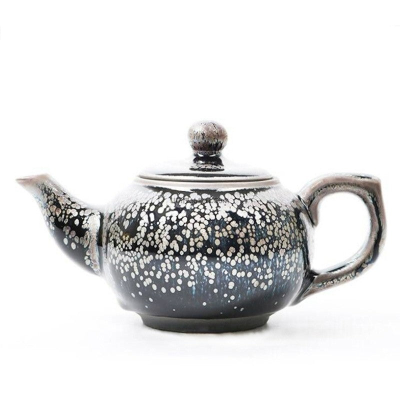 Close-up of Tianmu Zhan handmade Chinese teapot showing artistic kiln pattern