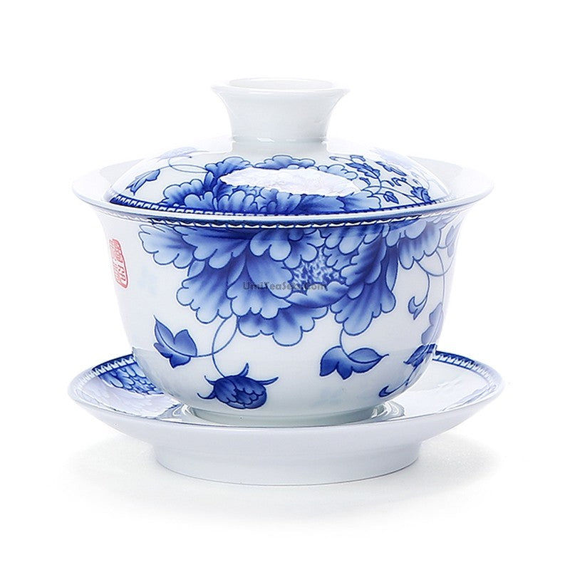 Blue and white porcelain gaiwan with intricate design for tea brewing