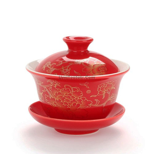 Using the Chinese gaiwan for brewing tea, with hot water pouring into the vessel