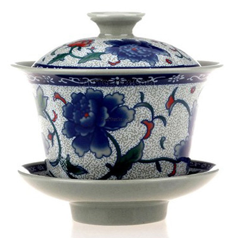 Blue Peony porcelain gaiwan set viewed from above, showcasing its intricate design and craftsmanship.