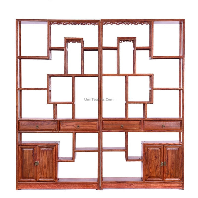 Elegant Chinese tea display cabinet showcasing fine tea sets and accessories.