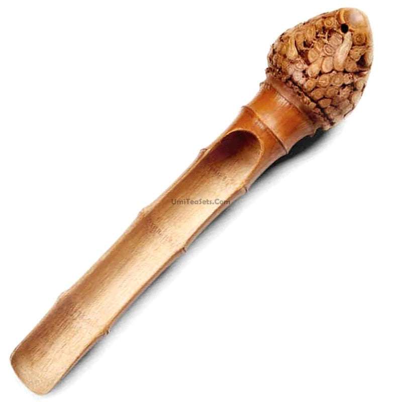 Close-up of handmade bamboo tea holder with dry tea leaves, elegant tea accessory
