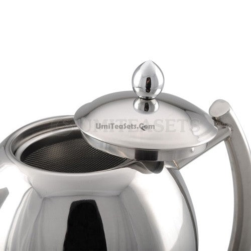Elegant stainless steel teapot with removable infuser from an angle, showcasing the mirror finish.